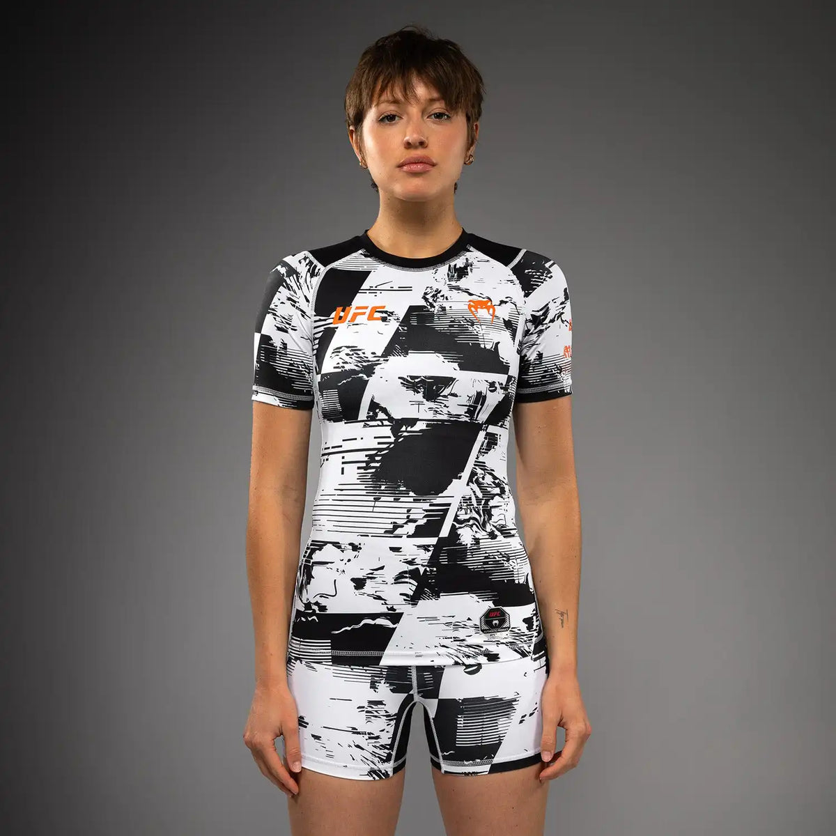 Women’s UFC Zenith by Venum White Authentic Fight Week Performance Short Sleeve Rashguard