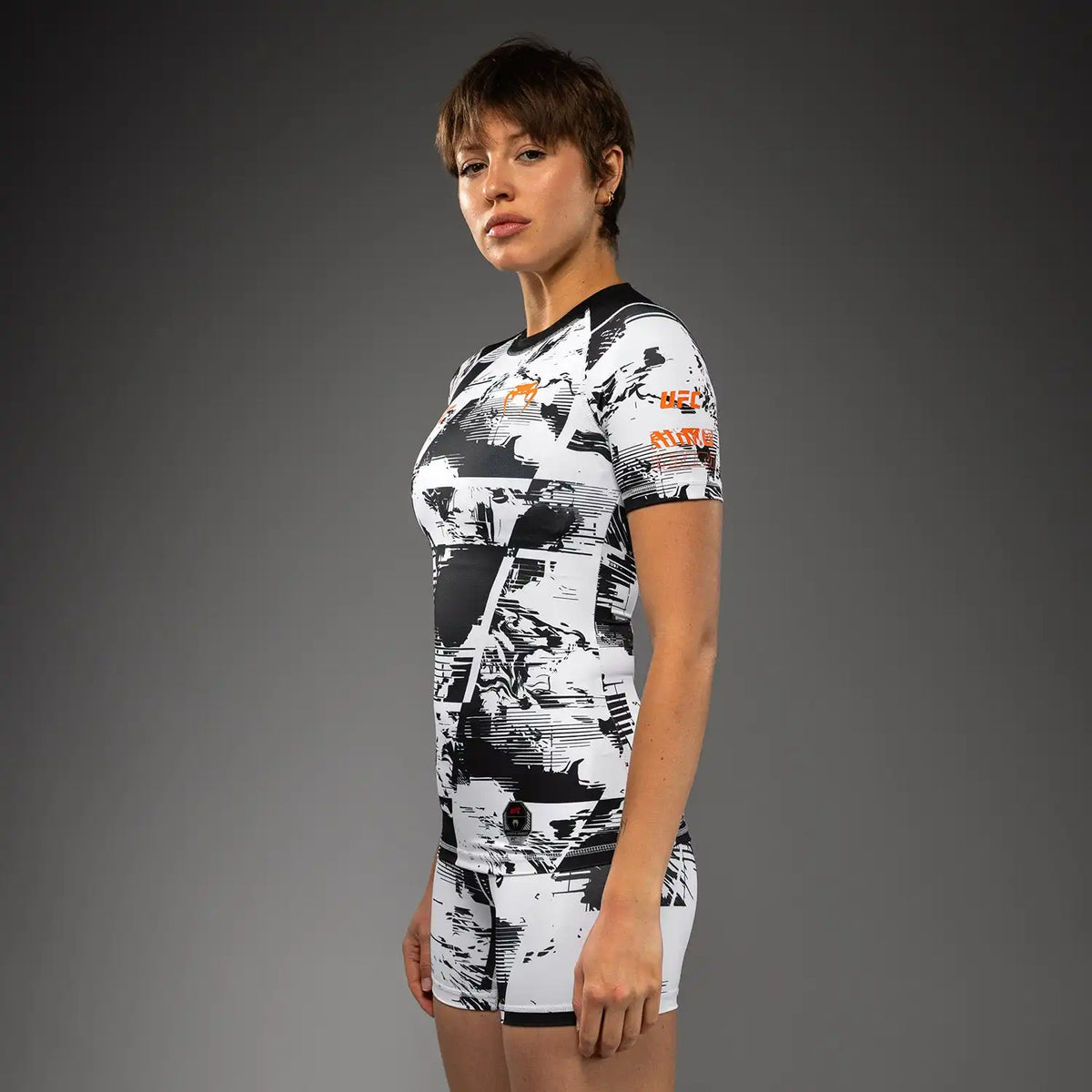Women’s UFC Zenith by Venum White Authentic Fight Week Performance Short Sleeve Rashguard